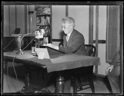 Prime Minister Joseph Lyons using a radio microphone, Sydney, ca. 1932 [picture]