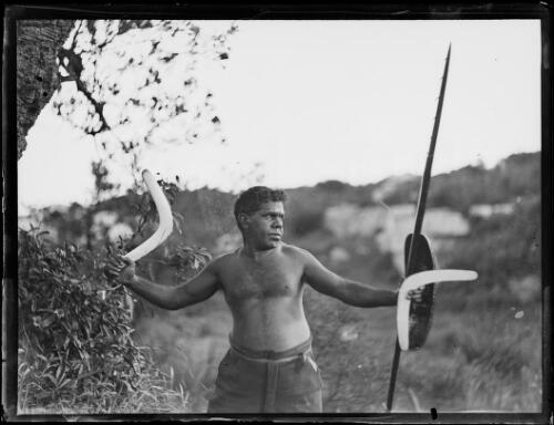 Tom Foster holding boomerangs, a spear and a shield, La Perouse, New South Wales, 3 January 1933 [picture]