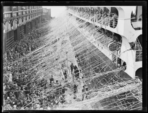 Passengers releasing streamers onto the crowd below as the ship Orion departs, Sydney, 27 February 1937 [picture]