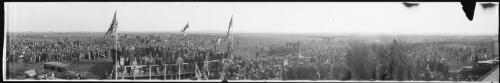 Panorama of crowd assembled at the reception for Charles Ulm and Charles Kingsford Smith at the end of the first trans-Pacific flight, Mascot Aerodrome, Sydney, 10 June 1928, 3 [picture] / EB Studios