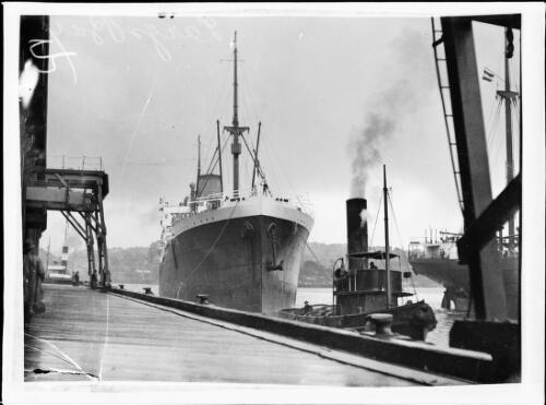 S.S. Largs Bay attached to a tug boat, New South Wales, ca.1930 [picture]