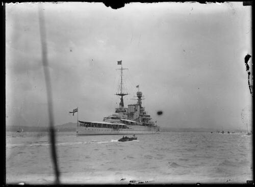 HMS Renown, flying a Royal Pennant and carrying the Duke and Duchess of York on their royal visit, entering Sydney Harbour with Inner South Head in the background, Sydney, 1927, 2 [picture]