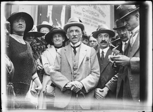 Prime Minister Billy Hughes standing with a crowd on his return from the Paris Peace Conference, Sydney, 1919, 1 [picture]
