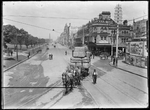 Horse team transporting bales of wool along Elizabeth Street in Sydney, 1911 [picture]
