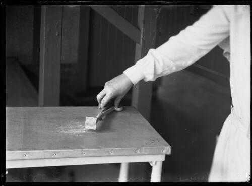 Nurse's hand holding a medical instrument in the Radium Clinic at the Prince Alfred Hospital, Sydney, ca. 1929 [picture]