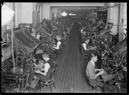 Men working on the linotype machines in the Sydney Morning Herald building on Hunter Street, Sydney, ca. 1930 [picture]