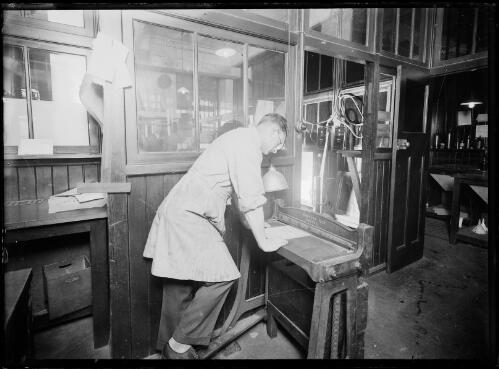 Newspaper employee continues manufacturing process, New South Wales, ca. 1910s [picture]