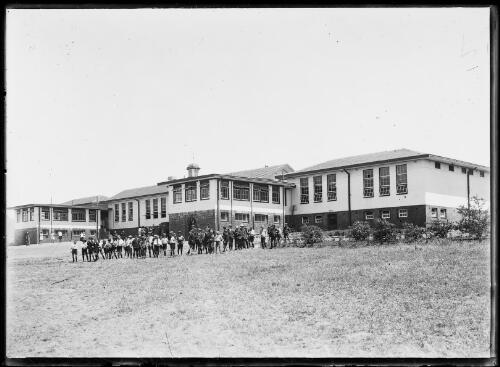 Children standing out the front of Telopea Park School, Canberra, ca. 1930 [picture]