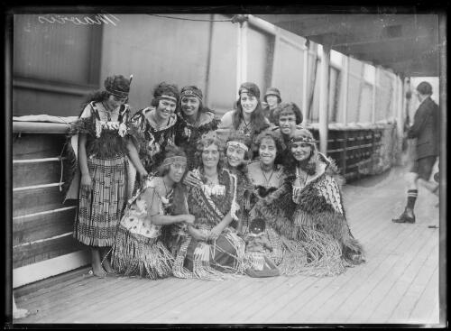 Female members of the Maiata Maori Choir in traditional dress on the deck of a boat, New South Wales, 1 [picture]