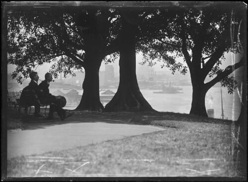 Two men sitting on a park bench Observatory Hill looking west, ca. 1930s [picture]