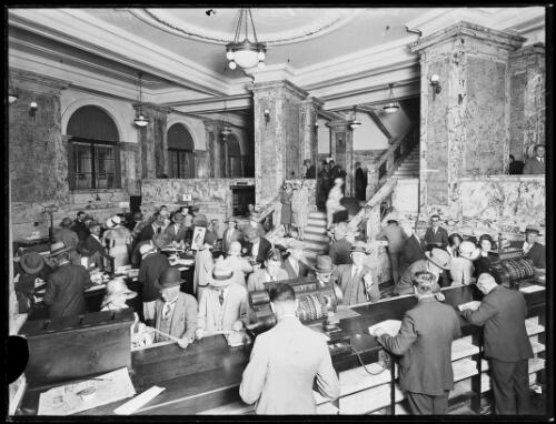 Members of the public at the counters of the Hunter Street office of the Sydney Morning Herald, 1930 [picture]