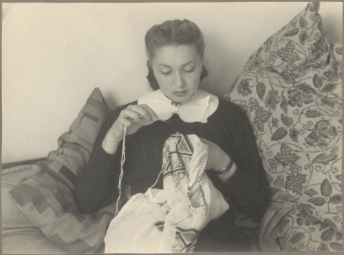 Domestic study of Irina Baronova sewing, Ballets Russes, ca. 1930s [picture]