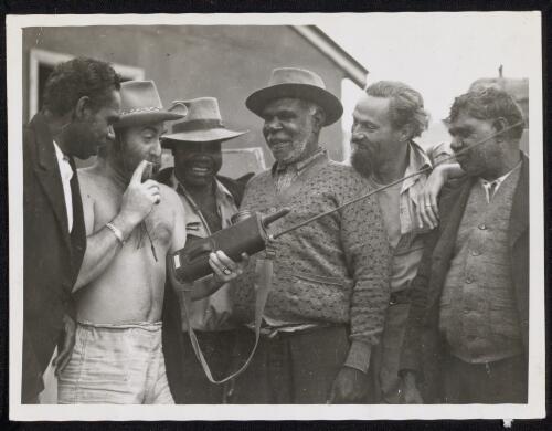 Peter Finch with Al Thomas and four Australian Aboriginal men on the set of Eureka Stockade, Singleton, 1947 [picture]