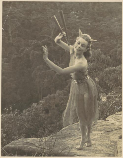 Moya Beaver posing outdoors in costume for The reed pipes of Pan, 1935, [7] [picture] / photograph by Dorothy White