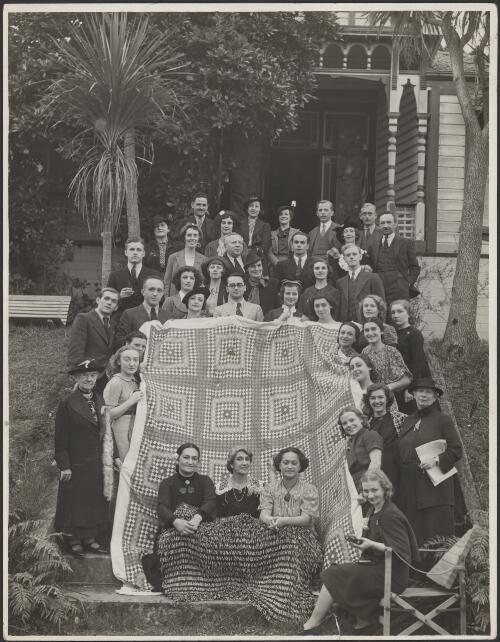 Members of the Monte Carlo Russian Ballet company visiting eminent Maori women including Lady Pomare (seated front centre) at Hiwiroa, Lower Hutt, New Zealand, 1937, 2 [picture] / W. Hall Raine