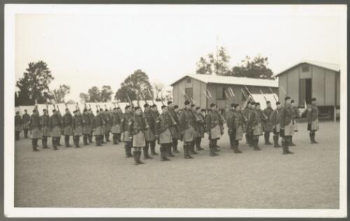 [Edmund Barton [?] in uniform marching with other soldiers in kilts] [picture]