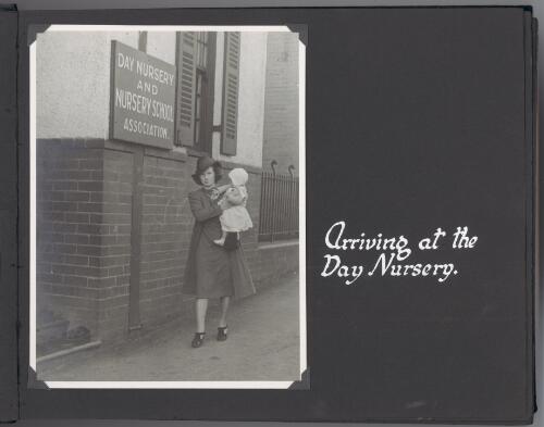 [Photograph of a woman and child] arriving at the day nursery [picture]