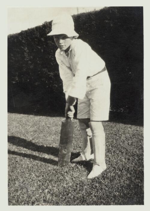 Rohan Rivett as a child holding a cricket bat, December 1926 [picture]