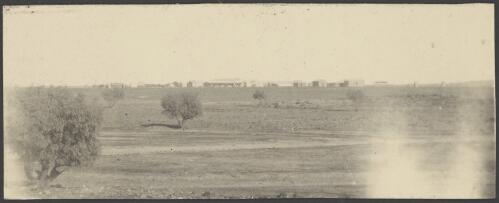 Cottages at a distance, Birdsville, Queensland, 1914 / Alexander Lorimer Kennedy