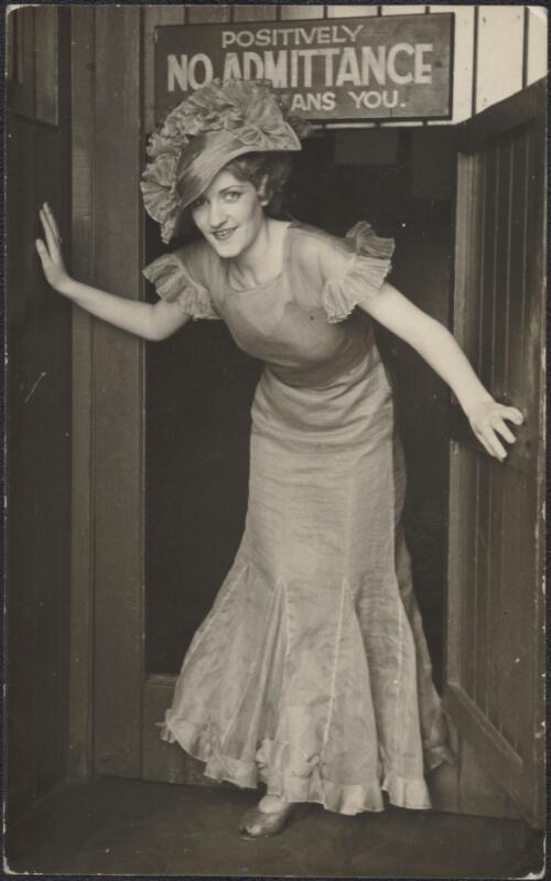 Female performer stepping through a stage door, 1936