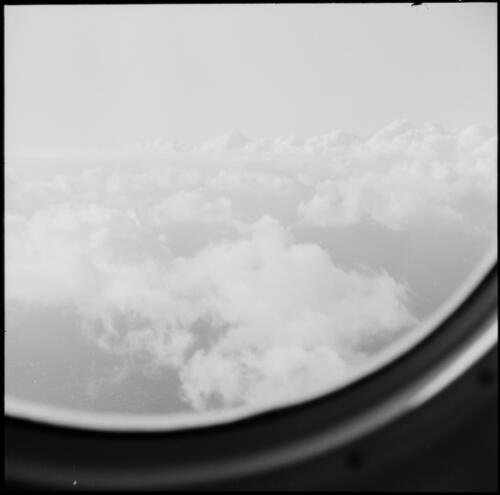 Clouds viewed through the window of an aeroplane, 1964 / Michael Terry
