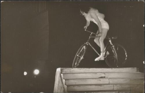 Trick bicycle rider on stage during a performance, 1936, 1