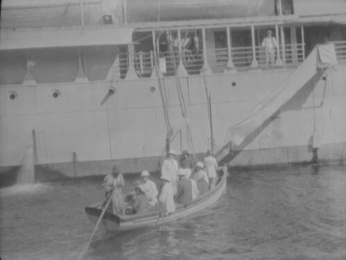 Passengers disembarking from TSS Islander in a rowing boat at Christmas Island, approximately 1934