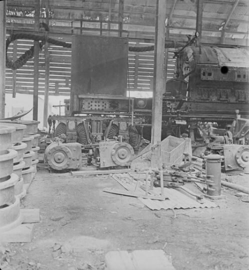 Parts of a disassembled steam locomotive on a flat wagon at a railway workshop, approximately 1920, 2