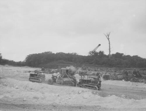 Several Christmas Island Phosphate Company earth moving machinery at the phosphate mine, Christmas Island, approximately 1927, 1