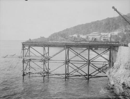 Workman at the Christmas Island Phosphate Company pier construction, Christmas Island, approximately 1927