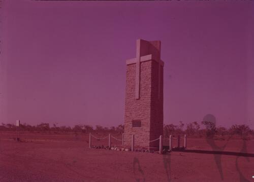 John Flynn memorial monument, intersection of the Stuart and Barkly Highways, Northern Territory, approximately 1950 / Frank Hurley