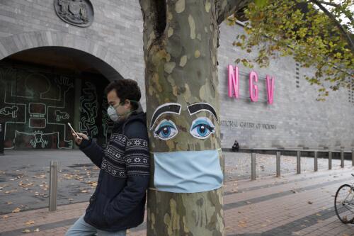 A tree decorated in face mask outside the National Gallery of Victoria, during the COVID-19 pandemic, Melbourne, Victoria, 26 April 2020 / Leigh Henningham