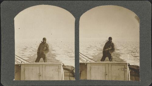 Member of the crew standing on the stern of the Nimrod, Ross Sea, Antarctica, 1908 / T. W. Edgeworth David