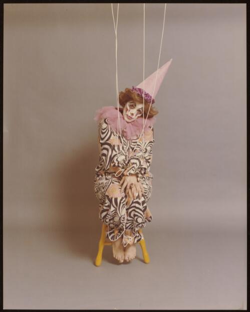 Model dressed as a pierrot marionette, approximately 1965 / Athol Shmith