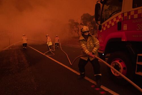 Firefighters fighting the Clear Range bushfire burning out of control on the outskirts of Bredbo, New South Wales, 1 February, 2020, 3 / Matthew Abbott
