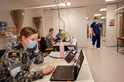 Australian Defence Force member Alison Hishon, taking phone bookings for COVID-19 testing at Kyneton Hospital, Victoria, 12 August 2020 / Sandy Scheltema
