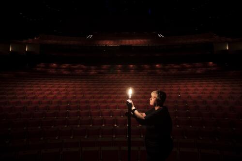 Ange Sullivan, head of lighting, preparing a ghost light at the Joan Sutherland Theatre, Sydney Opera House, 2020 / Daniel Boud