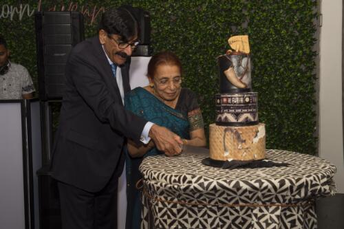 Mr and Mrs Raniga, cutting the Fiji Day Cake at inaugural fund raising dinner for maternal care hospitals in Fiji, 8 October 2021 / Michael Singh