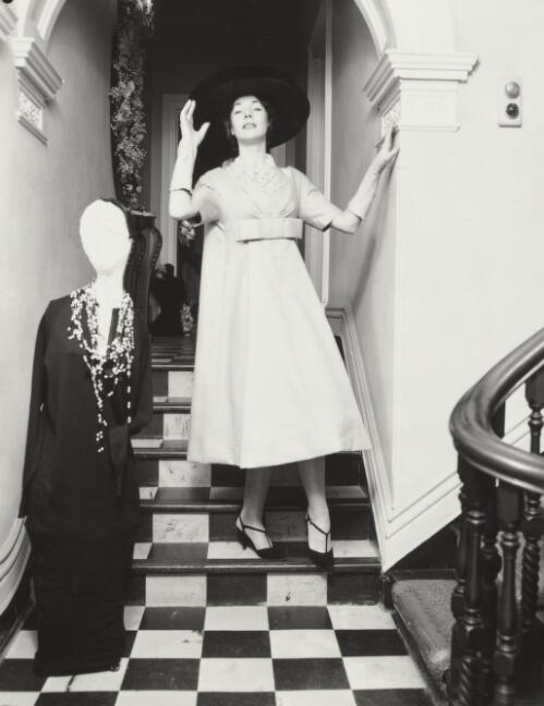 A fashion model posing along a corridor, approximately 1968, 2 / Athol Shmith