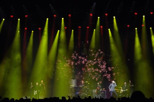 Midnight Oil performing on stage, Rod Laver Arena, Melbourne, Victoria, 27 March 2022, 2 / Martin Philbey