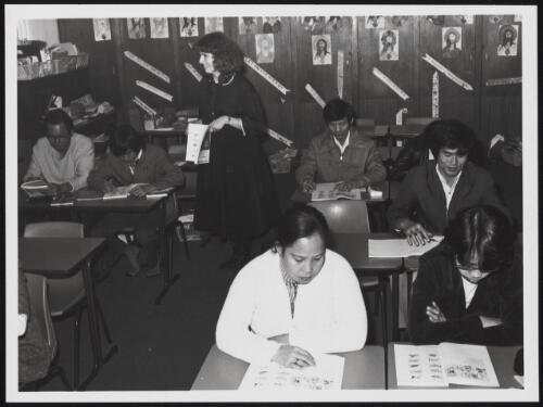 English teacher Maria Trefely, with refugees from Indochina in a class run by the Metta Foundation, Sydney, 1979 / Australian Information Service photograph by Peter Kelly