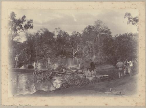 Workers constructing a dam wall, Daly Waters, Northern Territory, approximately 1886