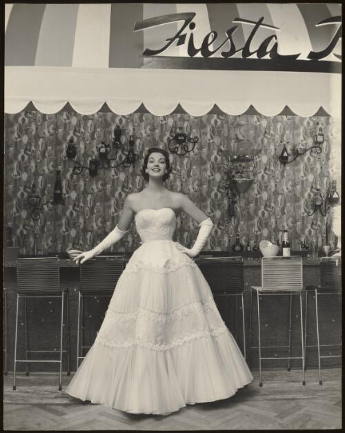 Model in evening dress, approximately 1960 / Athol Shmith