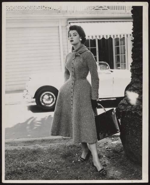 Model wearing coat style dress, approximately 1955, 2 / Athol Shmith