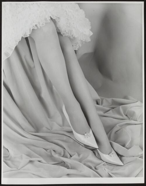 Model's legs and feet in shoes, approximately 1955 / Athol Shmith
