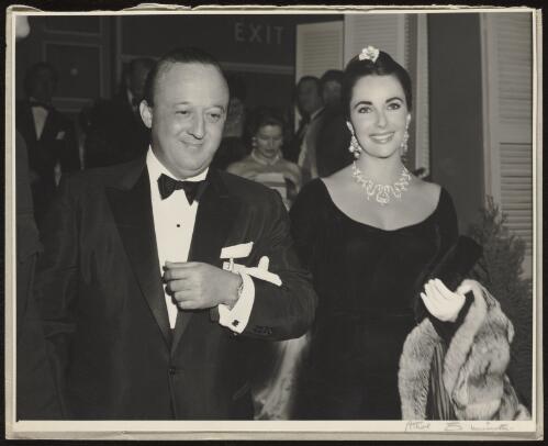 Elizabeth Taylor and an unnamed man at the Miss Australia coronation ball, 1957 / Athol Shmith