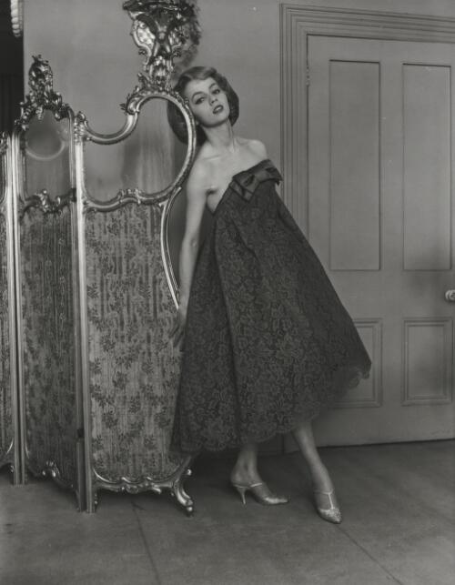Fashion model wearing strapless lace dress, approximately 1968, 4 / Athol Shmith