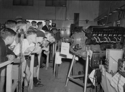 Crowds looking at a display of engines at the Newcastle Show, Newcastle, New South Wales, Februrary 1951