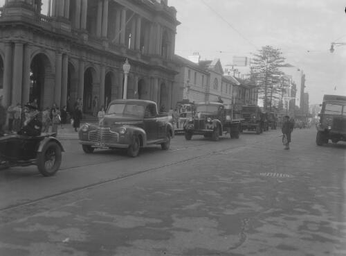 Convoy of trucks carrying supplies for Maitland flood victims leaving from Hunter Street, Newcastle, New South Wales, 1949, 2