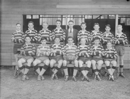 Group portrait of Sydney Grammar School pupils' rugby team 15B and coaches, Sydney, 8 August 1949